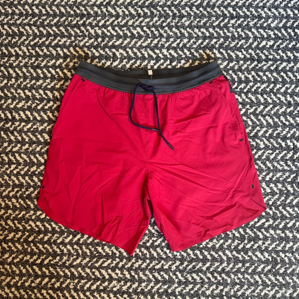 Greyson Running Wolf Shorts in Cayenne